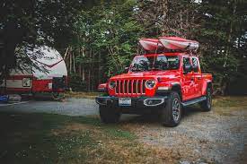 A Red jeep wrangler with names