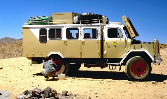 flat truck tire in desert