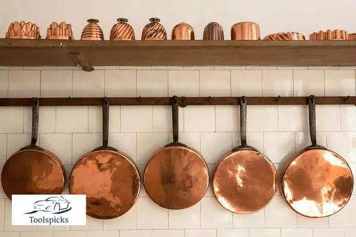 copper utensils hanging