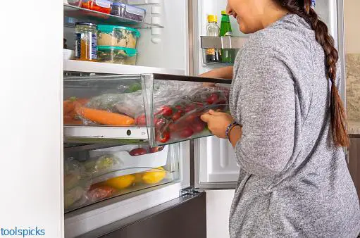 ge monogram refrigerator not cooling
