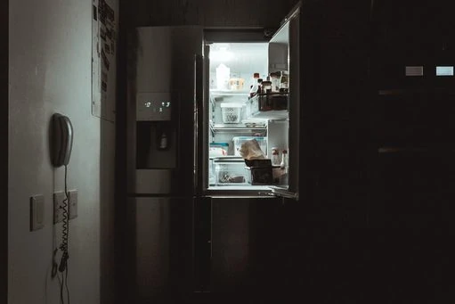 ge refrigerator ice maker reset