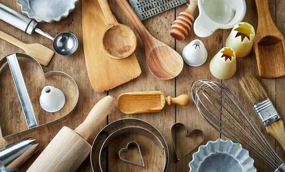 various kitchen utensils on wooden table- beginners baking set