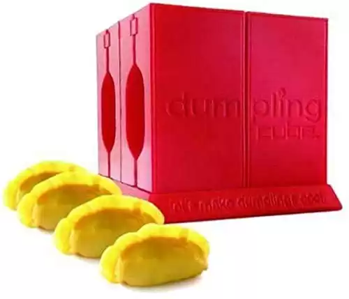 Dumpling Cube - Makes 4 Traditional Gyoza Style Dumplings at a time. Shape, Fold and Trim, with a Pastry Cutter included